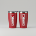 Two red tumblers labeled 'DRUNK 1' and 'DRUNK 2' on a gradient background with decorative elements.